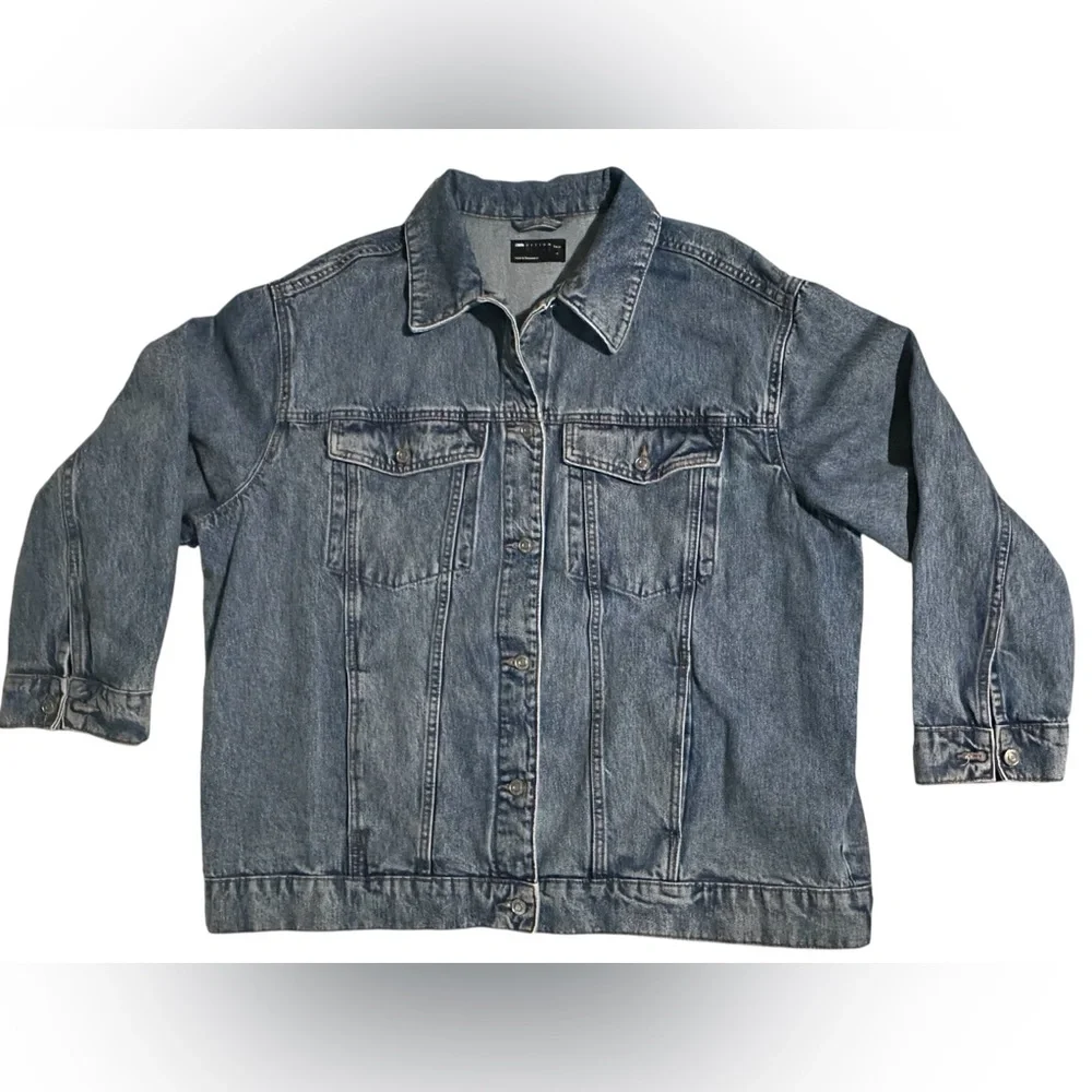 ASOS design denim truckers oversized, relaxed jacket in a medium blue wash.(L)